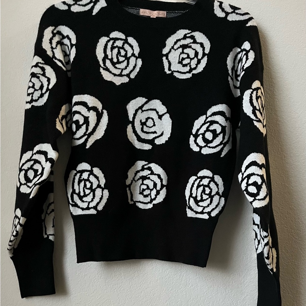 Elegant Black and White Floral Sweater by Evolutionary